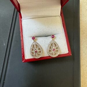 14 K genuine, diamond and Ruby earrings